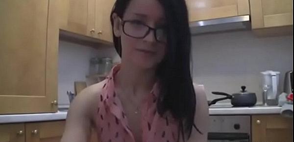  splendid teen with glasses chatting in the kitchen